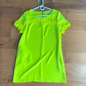 Bright yellow-green dress with lace crochet trim